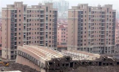 China sets record in bad asset disposals, shifts focus to housing market