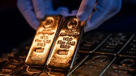 Traders are pouring into gold ETFs at record pace as trade and inflation worries grow